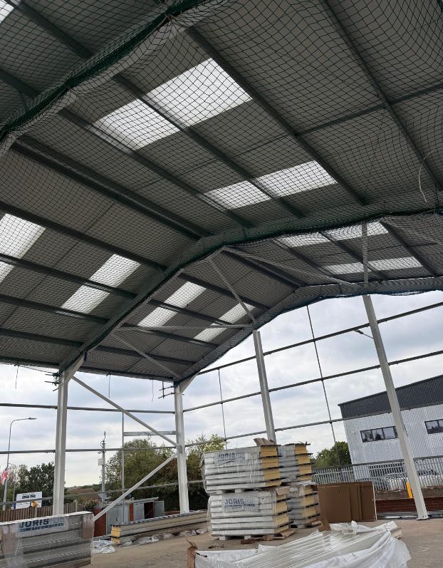 Frame and roof with safety netting