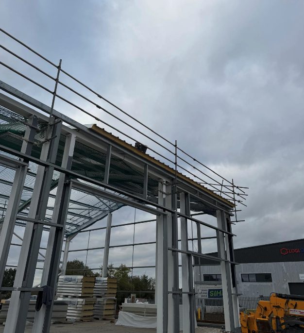 Frame complete, cladding on site
